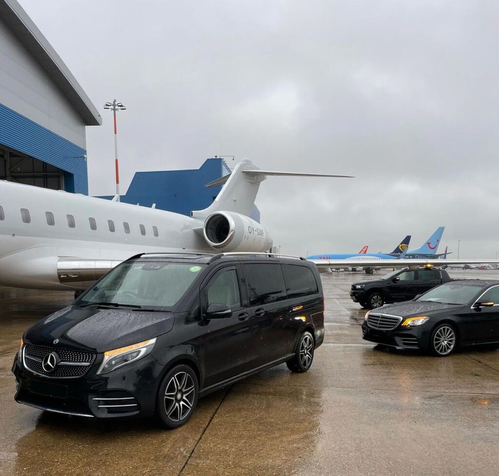 Luxury chauffeur car waiting for US passengers at Heathrow
